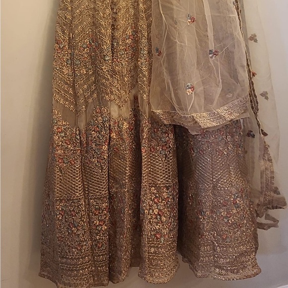 Heavily embroidered golden long salwar kameez - Picture 2 of 3